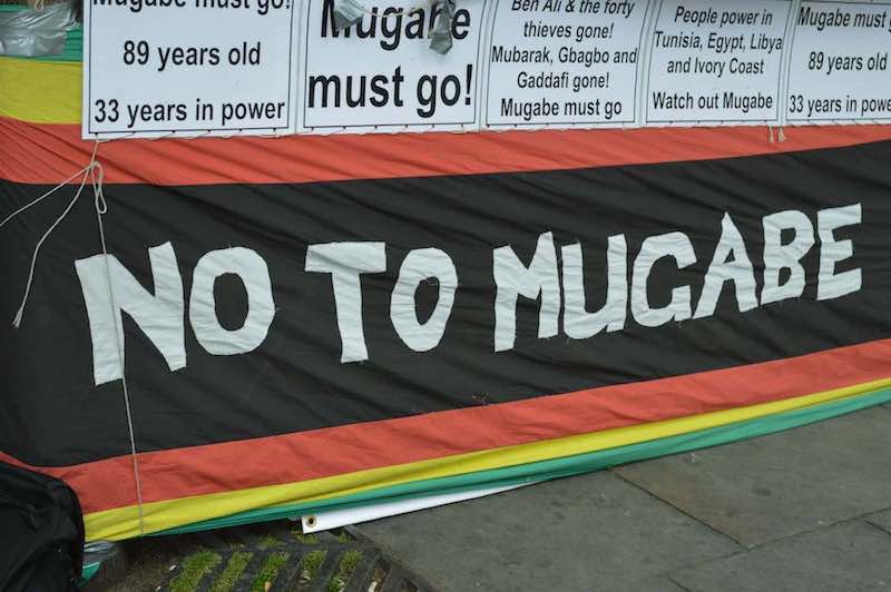 No to Mugabe sign by Flickr user mrgarethm